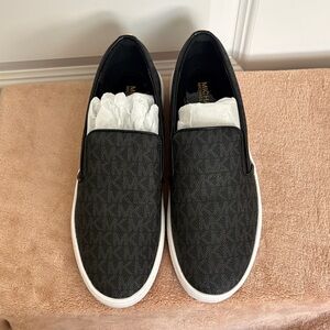 Michael Kors Black Signature Keaton Slip-On Sneakers with White Sole